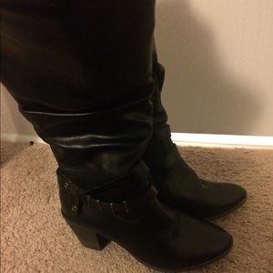 Black heeled boots, calf covering. EUC